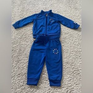 Adidas tracksuit blue size 9-12m